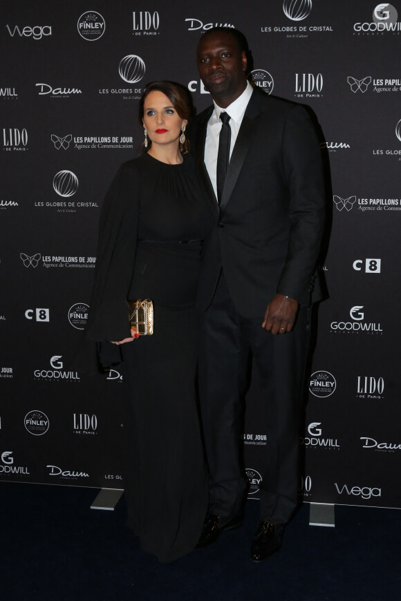 Omar Sy et sa femme Hélène au photocall de la 11ème cérémonie des Globes de Cristal au Lido à Paris le 30 janvier 2017. © CVS / Bestimage 