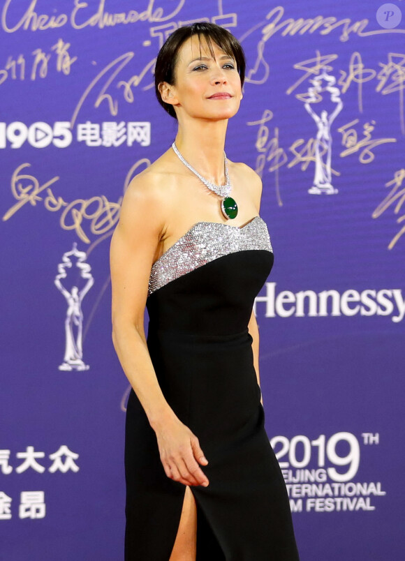 Sophie Marceau sur le tapis rouge de la cérémonie d'ouverture du 9e festival international du film de Pékin, Chine, le 13 avril 2019.