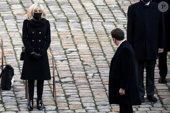 Le président de la république, Emmanuel Macron accompagné de la première dame Brigitte Macron lors de l'hommage national rendu à Daniel Cordier aux Invalides, à Paris le 26 novembre 2020, Paris. © Stéphane Lemouton / Bestimage