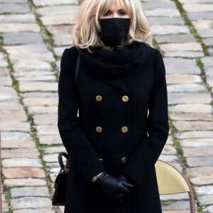 Le président de la république, Emmanuel Macron accompagné de la première dame Brigitte Macron lors de l'hommage national rendu à Daniel Cordier aux Invalides, à Paris le 26 novembre 2020, Paris. © Stéphane Lemouton / Bestimage