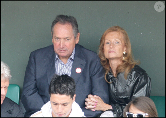 Gerard Houllier et son épouse à Roland-Garros en juin 2009.