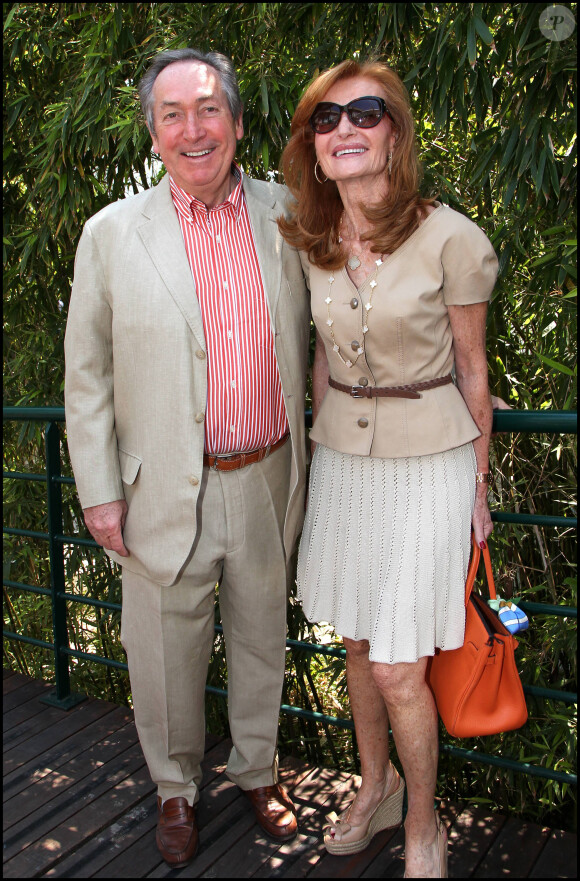 Gérard Houllier et son épouse à Roland-Garros en juin 2011.
