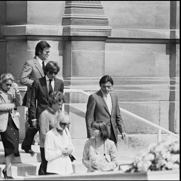 Daniel Biasini et Alain Delon aux obsèques de David Meyen, le fils de Romy Schneider, en 1981.