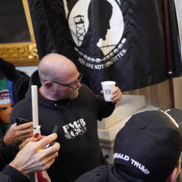 Des manifestants d'extrême droite partisans de Donald Trump tentent un coup d'État en envahissant le Capitole, le 6 janvier 2021, lors de l'officialisation de la victoire du président élu démocrate Joe Biden. @Chris Kleponis/SPUS/ABACAPRESS.COM