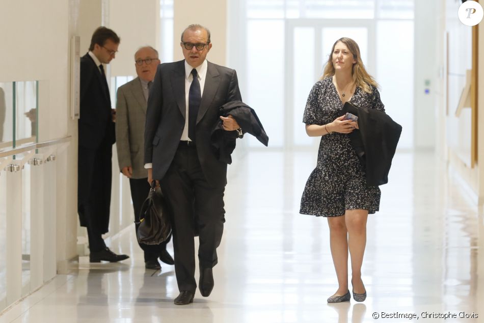L'avocat Hervé Temime et l''avocate Julia Minkowski (femme de B.Griveaux) - Arrivées au tribunal correctionnel de Paris pour le procès Bernard Tapie le 9 juillet 2019. Bernard Tapie et le PDG d'Orange, Stéphane Richard, sont les prévenus vedettes du procès pénal de l'arbitrage rendu en 2008 en faveur de l'ancien homme d'affaires, dans son contentieux avec le Crédit lyonnais sur la vente du fabricant d'équipements de sport Adidas en 1993, qui s'est ouvert le lundi 11 mars. L'homme d'affaires et patron du groupe de médias "La Provence", qui lutte à 76 ans contre un cancer de l'estomac, n'était pas au tribunal. Après dix ans de péripéties judiciaires, Bernard Tapie, 76 ans, est jugé pour escroquerie et détournement de fonds publics ; Stéphane Richard, 57 ans, qui était alors directeur de cabinet de la ministre de l'Economie Christine Lagarde, pour complicité. © Christophe Clovis/Bestimage