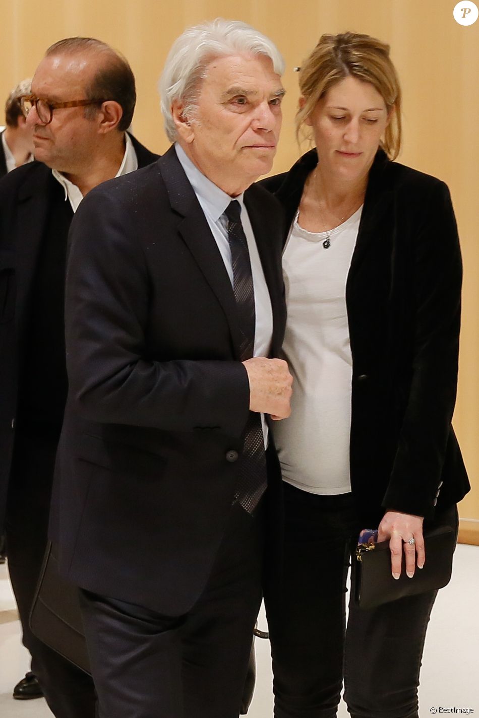 Exclusif - Bernard Tapie et ses avocats Hervé Témime et Julia Minkowski enceinte (femme de B.Griveaux) - B.Tapie à la sortie de la 11ème chambre correctionnelle, 2ème section du tribunal de Paris accompagné de ses avocats H.Témime et J.Minkowski à Paris, France, le 1er avril 2019. Le ministère public a requis 5 ans ferme pour Tapie et 3 ans pour S.Richard dont 18 mois avec sursis et interdiction d'exercer toute fonction publique pendant 5 ans. B.Tapie et le PDG d'Orange, S.Richard, seront les prévenus du procès pénal de l'arbitrage rendu en 2008 en faveur de l'ancien homme d'affaires, dans son contentieux avec le Crédit lyonnais sur la vente du fabricant d'équipements de sport allemand Adidas en 1993, qui s'est ouvert le 11 mars 2019. L'homme d'affaires et patron du groupe de médias "La Provence", qui lutte à 76 ans contre un cancer de l'estomac, n'a fait aucune déclaration à son arrivée au tribunal. Après dix ans de péripéties judiciaires, B.Tapie, est jugé pour escroquerie et détournement de fonds publics; S.Richard, 57 ans, qui était alors directeur de cabinet de la ministre de l'Economie C.Lagarde, pour complicité. © CVS/Bestimage