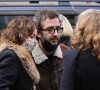 Exclusif - Cendrine Dominguez et son compagnon Cyrille Eldin - Sorties des obsèques de Hubert Auriol au Temple de l'Oratoire du Louvre à Paris.