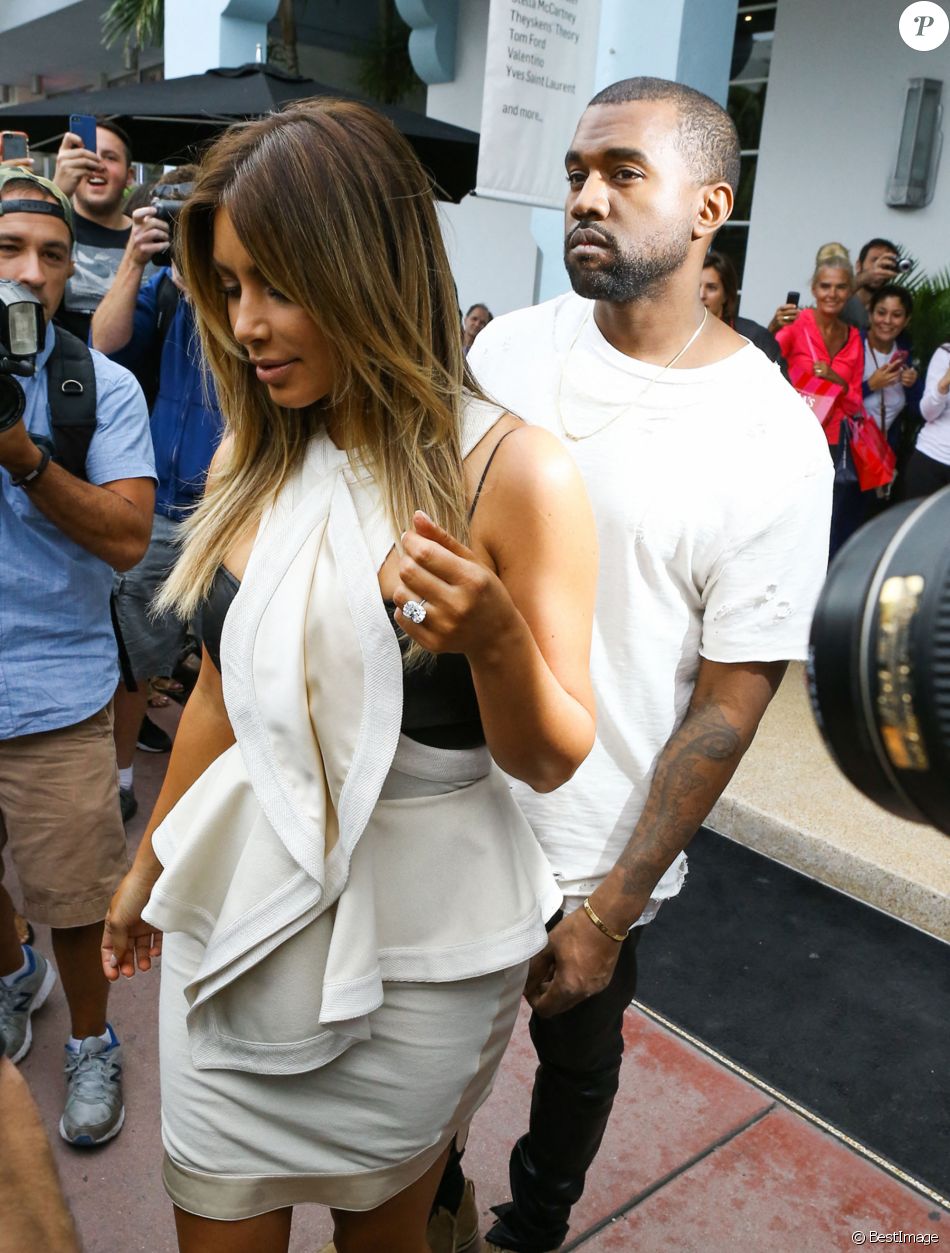 Info - 10 millions d'euros de bijoux volés à Kim Kardashian lors du braquage à Paris dont une bague à 4 millions d'euros - Kim Kardashian et son fiance Kanye West vont faire du shopping a Miami, le 29 novembre 2013.