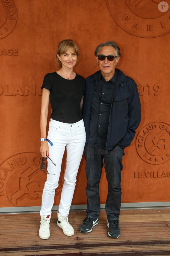 Richard Berry et sa femme Pascale Louange dans le village lors des internationaux de tennis de Roland Garros à Paris, France, le 4 juin 2019. © Jacovides-Moreau/Bestimage