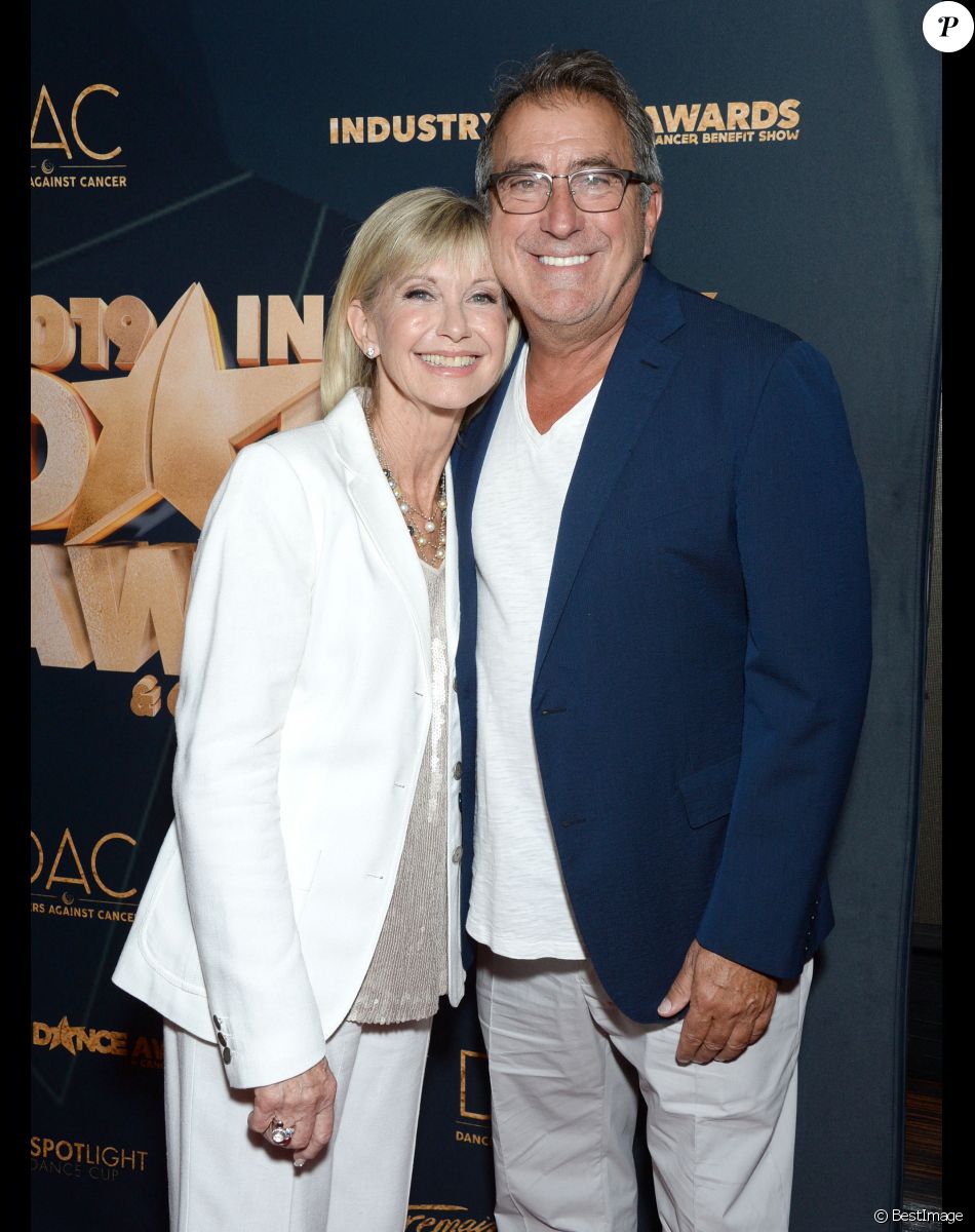 Olivia Newton-John, Kenny Ortega au photocall des "Industry Dance Awards 2019" à Los Angeles, le 14 août 2019.