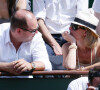 Archives - Cauet et sa femme Virginie lors des internationaux de tennis de France de Roland Garros à Paris, le 3 juin 2010.