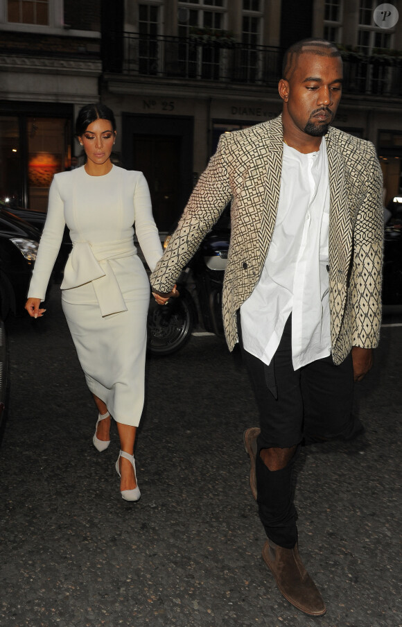 Kanye West et sa femme Kim Kardashian vont dîner au restaurant Hakkasan à Londres, le 23 septembre 2014. 