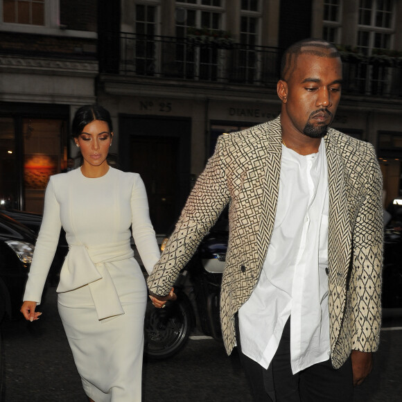 Kanye West et sa femme Kim Kardashian vont dîner au restaurant Hakkasan à Londres, le 23 septembre 2014. 