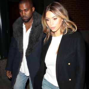 Kanye West se rend a son concert avec sa fiancee Kim Kardashian a New York, le 20 novembre 2013. 