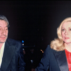 Archives - Serge Gainsbourg et Catherine Deneuve lors d'une soirée Cartier 