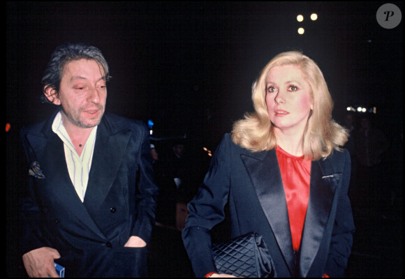 Archives - Serge Gainsbourg et Catherine Deneuve lors d'une soirée Cartier 