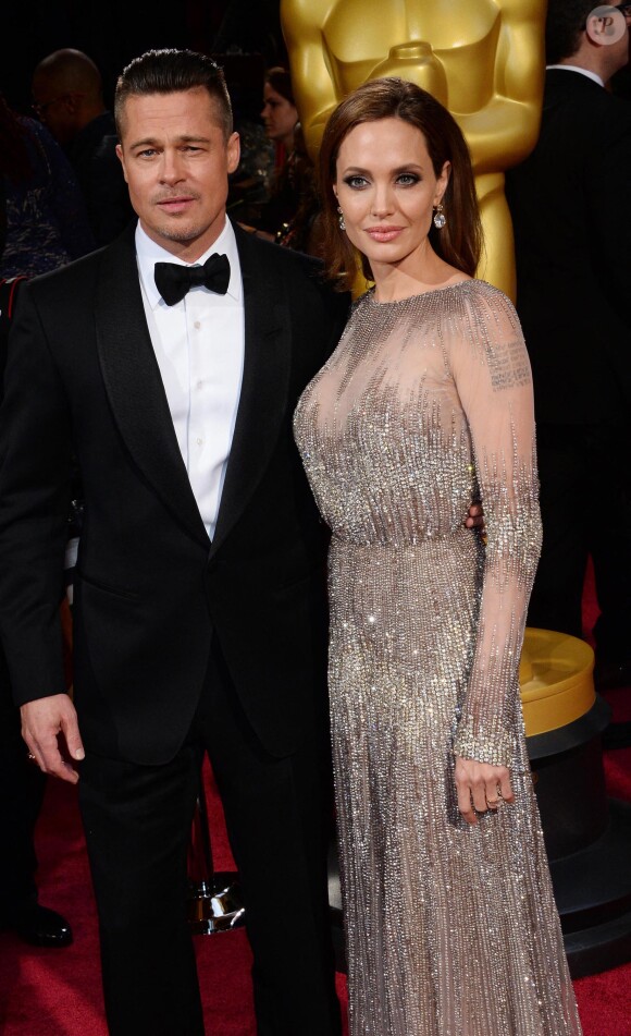 Brad Pitt et Angelina Jolie - 86ème cérémonie des Oscars à Hollywood, le 2 mars 2014. 
