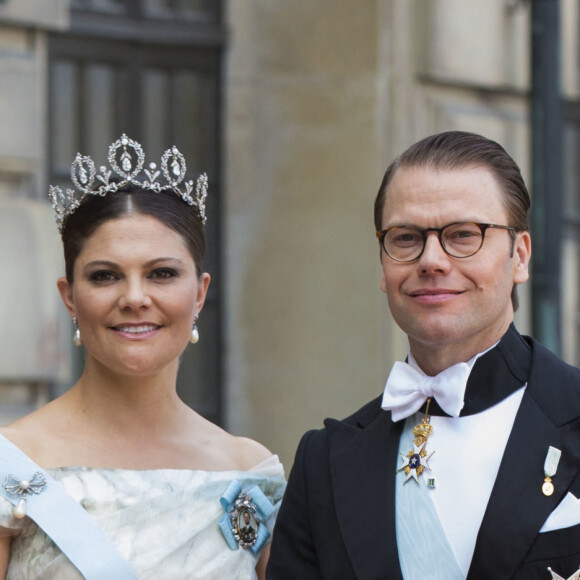 La princesse Victoria (en robe H&M) et le prince Daniel de Suède - Arrivées au mariage du prince Carl Philip de Suède et Sofia Hellqvist à la chapelle du palais royal à Stockholm. Le 13 juin 2015