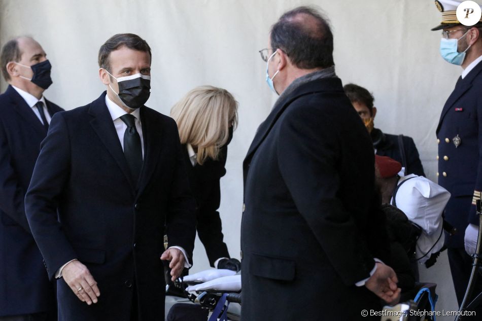 Le président de la république, Emmanuel Macron, François Hollande, Brigitte Macron et le Premier Ministre Jean Castex assistent à la cérémonie d'hommage aux victimes du terrorisme, devant la statue La Parole portée aux Invalides, Paris. Le 11 mars 2021. © Stéphane Lemouton / Bestimage