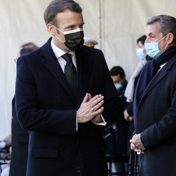 Le président de la république, Emmanuel Macron, et Nicolas Sarkozy assistent à la cérémonie d'hommage aux victimes du terrorisme, devant la statue La Parole portée aux Invalides, Paris. Le 11 mars 2021. © Stéphane Lemouton / Bestimage