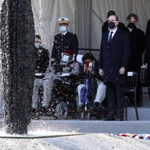 Le président de la république, Emmanuel Macron, participe à la cérémonie d'hommage aux victimes du terrorisme, devant la statue La Parole portée aux Invalides, Paris. Le 11 mars 2021. © Stéphane Lemouton / Bestimage