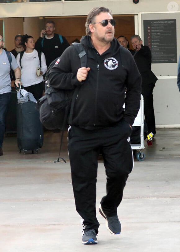 Exclusif - Russell Crowe arrive à l'aéroport Kingsford-Smith de Sydney, Australie, le 19 août 2019.