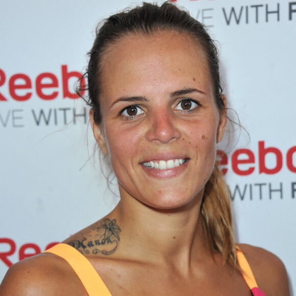 Laure Manaudou- Paris le, 15 09 2013 - La parisienne , la course aux 35000 participantes au champs de Mars