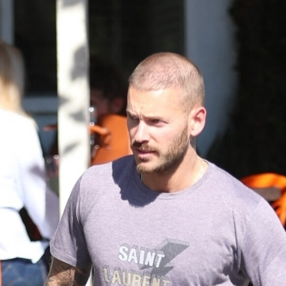 Matt Pokora et sa compagne Christina Milian se baladent avec leur fils Isaiah dans le quartier de West Hollywood à Los Angeles, le 11 février 2020.