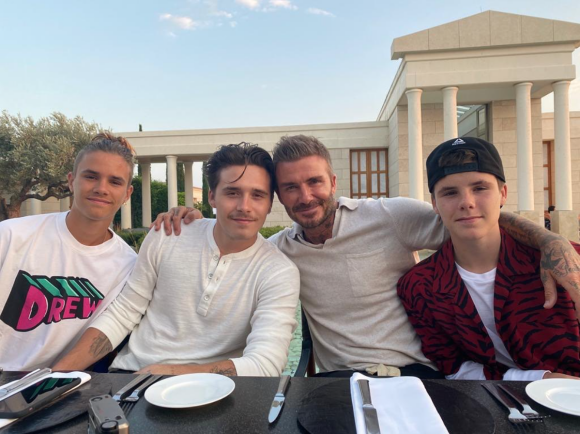 David Beckham et ses trois fils Brooklyn, Romeo et Cruz. Août 2020.