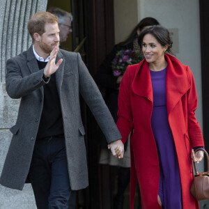 Le prince Harry, duc de Sussex, et Meghan Markle, duchesse de Sussex (enceinte de son fils Archie) lors d'une visite à Birkenhead le 14 janvier 2019.