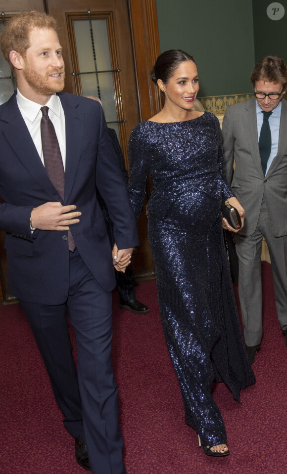 Le prince Harry, duc de Sussex, et Meghan Markle, duchesse de Sussex, enceinte de son fils Archie, à la représentation du 10ème anniversaire du spectacle du Cirque du Soleil "Totem" au Roayl Albert Hall à Londres, le 16 janvier 2019.