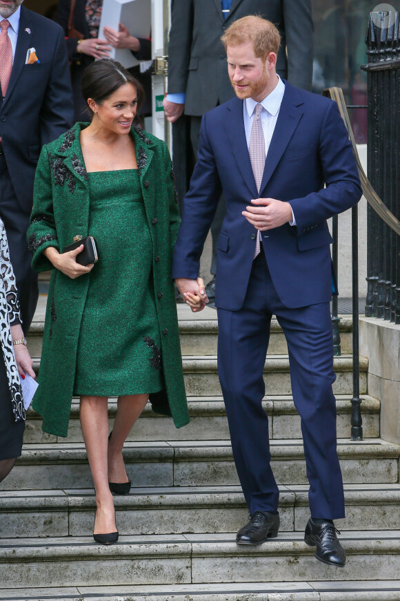 Le prince Harry, duc de Sussex, Meghan Markle, duchesse de Sussex (enceinte de son fils Archie), à la sortie de Canada House après une cérémonie pour la Journée du Commonwealth à Londres.