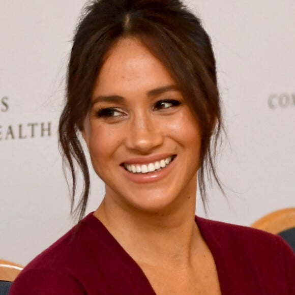 Le prince Harry, duc de Sussex, et Meghan Markle, duchesse de Sussex, participent à une réunion sur l'égalité des genres avec les membres du Queen's Commonwealth Trust au château de Windsor, le 25 octobre 2019.