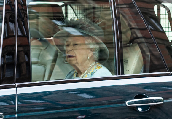 La reine Elisabeth II d'Angleterre arrive pour son discours d'ouverture de la session parlementaire à la Chambre des lords au palais de Westminster à Londres, Royaume Uni, le 11 mai 2021.