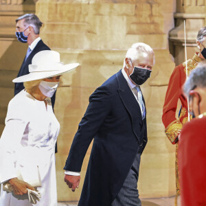 Le prince Charles, prince de Galles, et Camilla Parker Bowles, duchesse de Cornouailles, arrivent pour le discours d'ouverture de la session parlementaire de la reine d'Angleterre à la Chambre des lords au palais de Westminster à Londres, Royaume Uni, le 11 mai 2021.