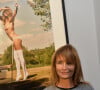 Axelle Laffont (pose devant sa photo Playboy) - Soirée de lancement du calendrier "Playboy 2020" à Paris. © Veeren/Bestimage