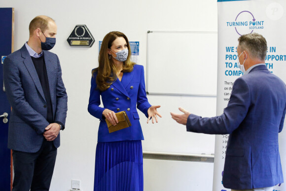 Le prince William, duc de Cambridge, et Kate Middleton, duchesse de Cambridge, visitent le centre de protection sociale de Turning Point Scotland à Coatbridge, en Écosse. Le 24 mai 2021.
