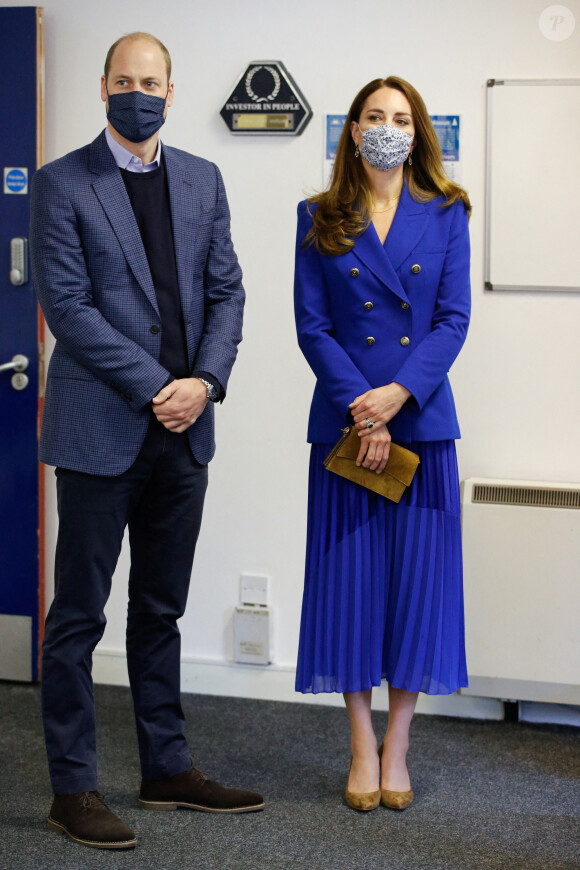 Le prince William, duc de Cambridge, et Kate Middleton, duchesse de Cambridge, visitent le centre de protection sociale de Turning Point Scotland à Coatbridge, en Écosse. Le 24 mai 2021.