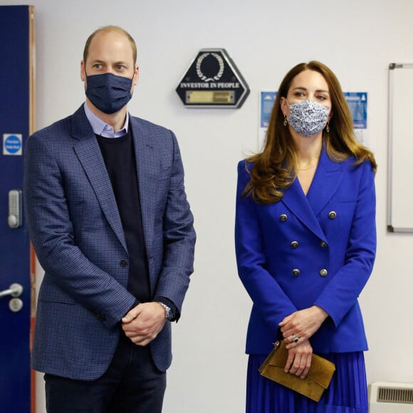 Le prince William, duc de Cambridge, et Kate Middleton, duchesse de Cambridge, visitent le centre de protection sociale de Turning Point Scotland à Coatbridge, en Écosse. Le 24 mai 2021.