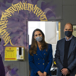 Le prince William et son épouse Kate Middleton, duchesse de Cambridge, visitent les locaux du centre Scottish Violence Reduction Unit à Prestonpans, en Écosse. Le 24 mai 2021.