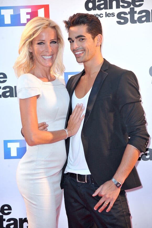 Ophélie Winter et Christophe Licata - Photocall de présentation de la nouvelle saison de "Danse avec les Stars 5" au pied de la tour TF1 à Paris, le 10 septembre 2014.