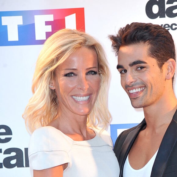 Ophélie Winter et Christophe Licata - Photocall de présentation de la nouvelle saison de "Danse avec les Stars 5" au pied de la tour TF1 à Paris, le 10 septembre 2014.