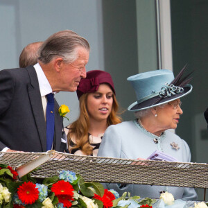 La reine Elisabeth II d'Angleterre, le prince Philip, Duc de Edinburgh et les princesses Beatrice et Eugenie assistent a la course hippique 'Investec Derby 2013' a Epson le 1er fevrier 2013.