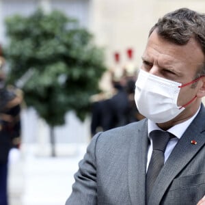 Le président de la République française, Emmanuel Macron accompagné de M. Pénicaud, reçoit Mathias CORMANN, Secrétaire général de l'OCDE pour un déjeuner de travail au palais de l'Elysée, le 9 juin 2021, à Paris. © Stéphane Lemouton / Bestimage