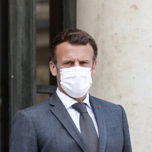 Le président de la République française, Emmanuel Macron accompagné de M. Pénicaud, reçoit Mathias CORMANN, Secrétaire général de l'OCDE pour un déjeuner de travail au palais de l'Elysée, le 9 juin 2021, à Paris. © Stéphane Lemouton / Bestimage