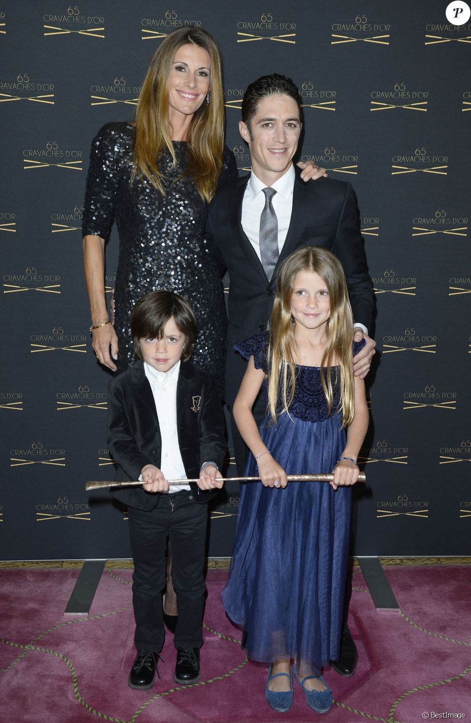 Sophie Thalmann, son mari Christophe Soumillon et leur enfants Charlie et Mika - 65ème édition des Cravaches d'Or au Théâtre des Champs-Elysées à Paris le 14 mars 2014.