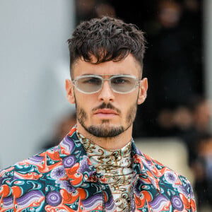Baptiste Giabiconi arrive au défilé de mode masculine prêt-à-porter printemps-été 2022 Dior x Travis Scott à Paris, France, le 25 juin 2021. © Clovis-Veeren/Bestimage