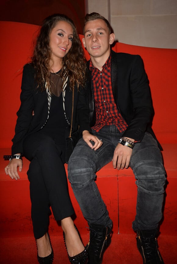 Lucas Digne (PSG) et sa compagne Tiziri - Soirée de lancement du jeu vidéo " FIFA 2015 " à l'Opéra Garnier Restaurant à Paris le 22 septembre 2014.