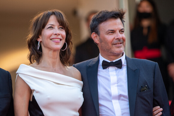 Sophie Marceau, François Ozon - Montée des marches du film " Tout s'est bien passé " lors du 74ème Festival International du Film de Cannes. Le 7 juillet 2021 © Borde-Jacovides-Moreau / Bestimage