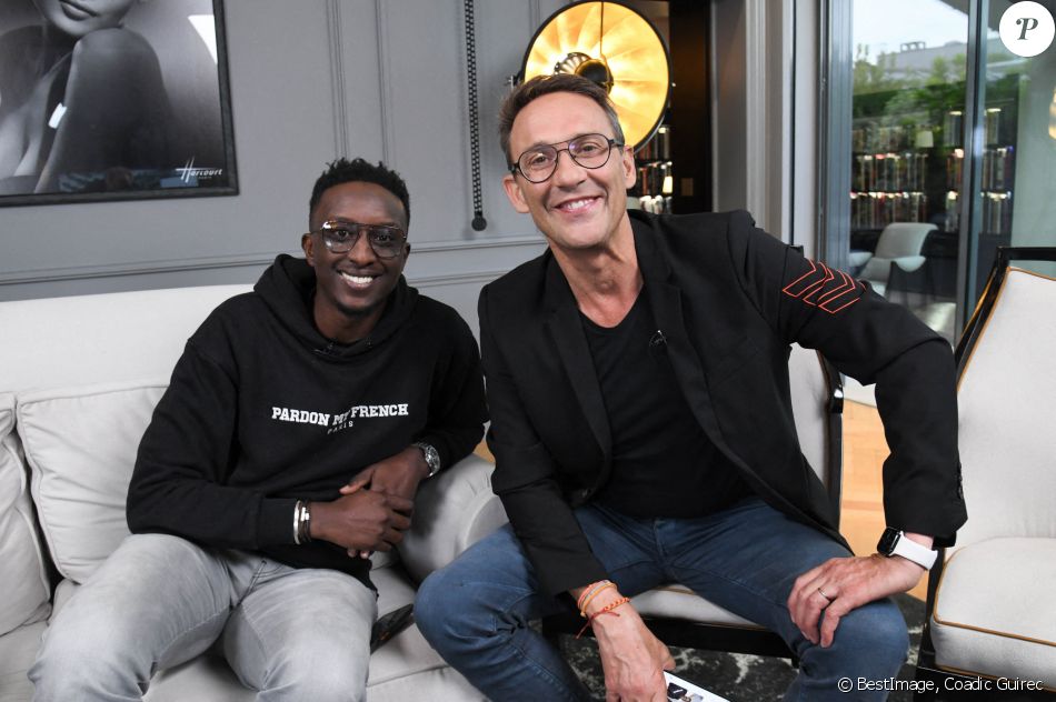 Ahmed Sylla et Julien Courbet - Personnalités à la soirée "Football Palace" à l'Hôtel Barrière Le Fouquet's Paris pour BarrièreBet. Le 23 juin 2021 © Coadic Guirec / Bestimage